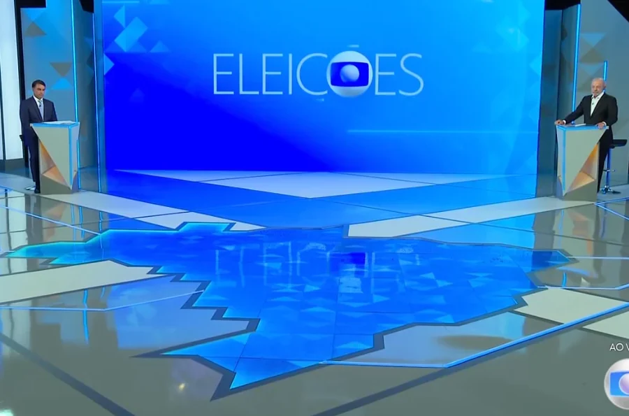 DEBATE 1º BLOCO: FLÁVIO BOLSONARO NÃO RESPONDE E LULA DÁ O TROCO COM PROPOSTAS